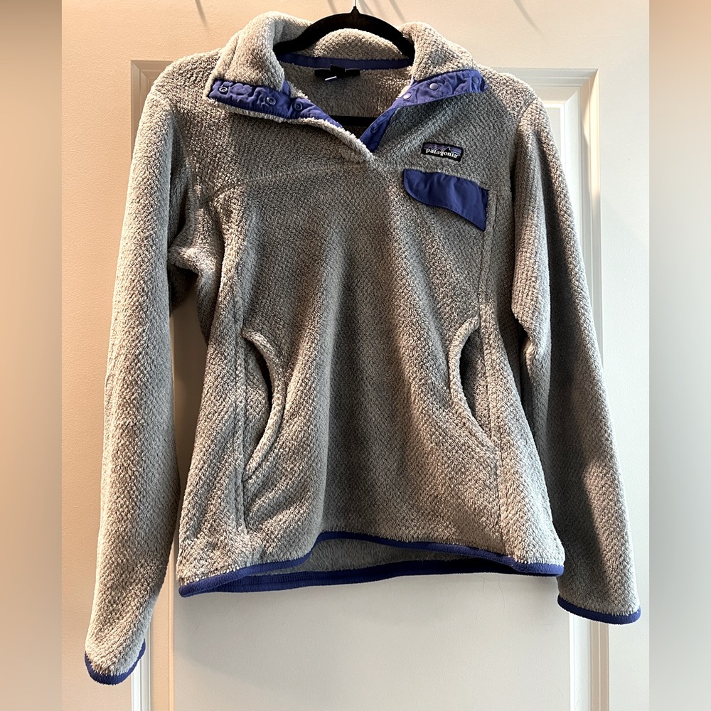 Grey Patagonia Snap-T Fleece Pullover with purple trim.